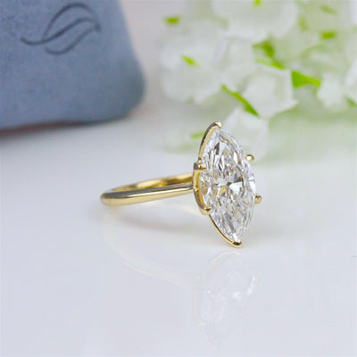 Marquise Diamond Accented Engagement Ring