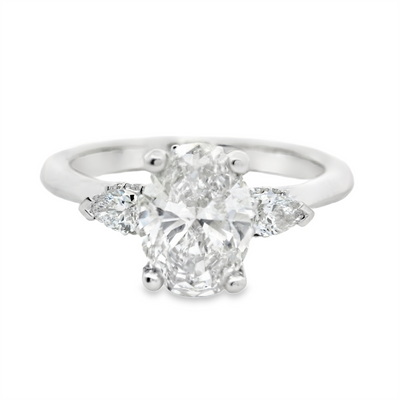 Oval Diamond Three Stone Hidden Halo Engagement Ring