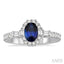 Oval Shape Gemstone & Halo Diamond Ring