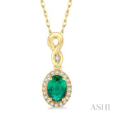 6x4 MM Oval Cut Emerald and 1/10 Ctw Round Cut Diamond Pendant in 10K Yellow Gold with Chain