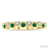 1/6 Ctw Round Cut Diamond and 1.80mm Emerald Precious Waves Wedding Band in 14K Yellow Gold