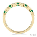 1/6 Ctw Round Cut Diamond and 1.80mm Emerald Precious Waves Wedding Band in 14K Yellow Gold