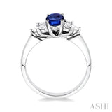 7x5mm Oval Cut Sapphire and 1/3 Ctw Round Cut Diamond Ring in 14K White Gold