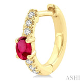 1/10 ctw Petite 4X3 MM Oval Cut Ruby and Round Cut Diamond Fashion Huggies in 10K Yellow Gold