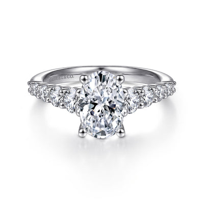 Oval Diamond Graduated Engagement Ring