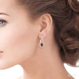 Oval Shape Champagne Diamond Earrings