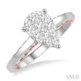 1/2 Ctw Pear Shape Lovebright Round Cut Diamond Ring in 14K White and Rose Gold
