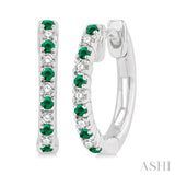 1/10 ctw Petite 1.35MM Emerald and Round Cut Diamond Precious Fashion Huggies in 10K White Gold
