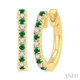 1/10 ctw Petite 1.35MM Emerald and Round Cut Diamond Precious Fashion Huggies in 10K Yellow Gold