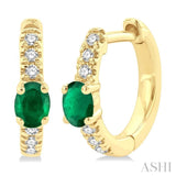 1/10 ctw Petite 4X3 MM Oval Cut Emerald and Round Cut Diamond Fashion Huggies in 10K Yellow Gold