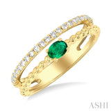 4X3MM Oval Shape Emerald and 1/5 ctw Single Cut Diamond Precious Split Twin Ring in 10K Yellow Gold